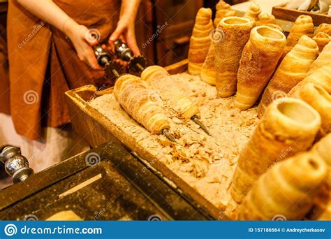 Preparation Of The Traditional TrdelnÃ­k A Kind Of Spit Cake Made From Rolled Dough Wrapped
