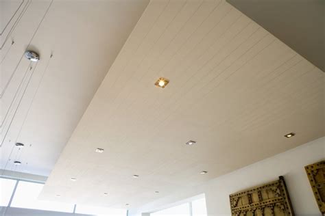 Any ceiling that is suspended below the original ceiling usually to conceal an ugly, or too high ceiling or to install flourescents with translucent panels to give the effect of the entire ceiling being lit up. The Best Lights to Put in a Suspended Ceiling | Hunker