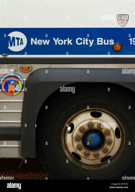 Wheel And Side Of A New York City Mta Bus Showing Mta Logo Stock Photo