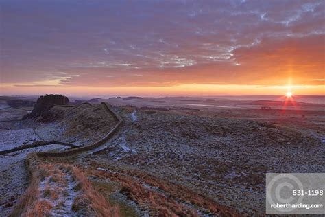 Sunrise And Hadrians Wall National Stock Photo