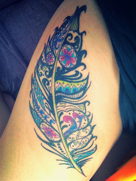 Colorful Feather Tattoo Located On Upper Thigh My Number 2
