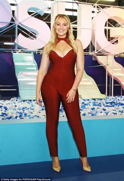 Iskra Lawrence Flaunts Her Ample Assets In A Skintight Catsuit At