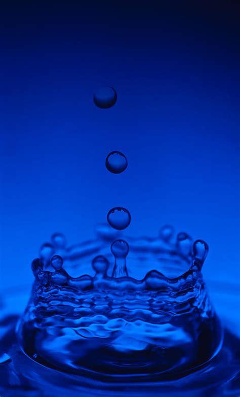 Blue Drop Photograph by Steve Gadomski