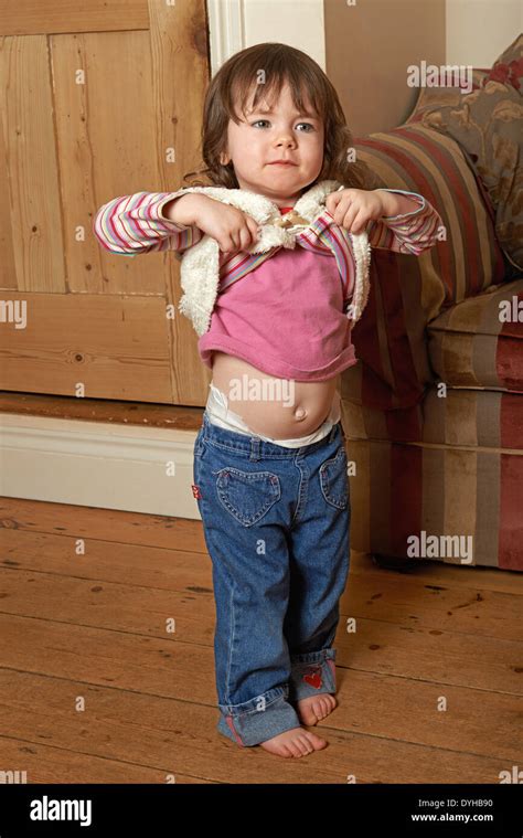 2 Year Old Girl Showing Belly Stock Photo Alamy