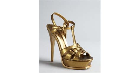 lyst saint laurent gold embossed leather tribute platform sandals in metallic