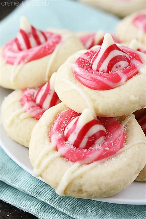 I remember my grandmother making these cookies every christmas. Peppermint Kiss Thumbprint Cookies | Creme De La Crumb