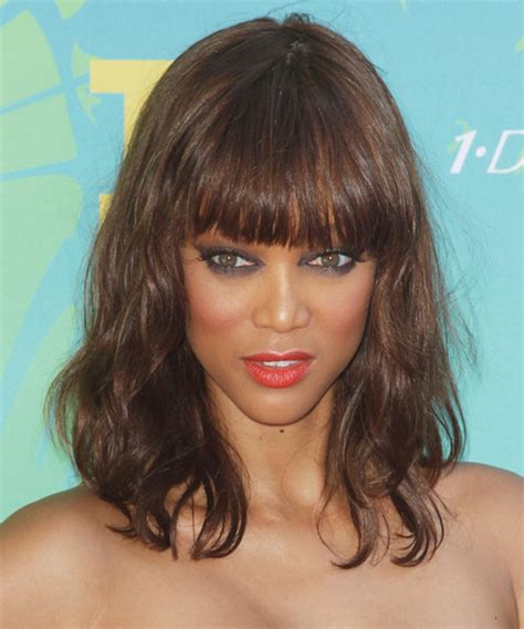 Tyra Banks Medium Wavy Chestnut Brunette Hairstyle With Blunt Cut Bangs