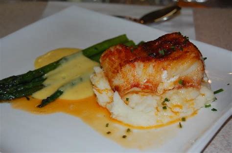 Stuffed Chilean Sea Bass With Chive Butter Creamy Mashed Potatoes And Sauteed Asparagus With H
