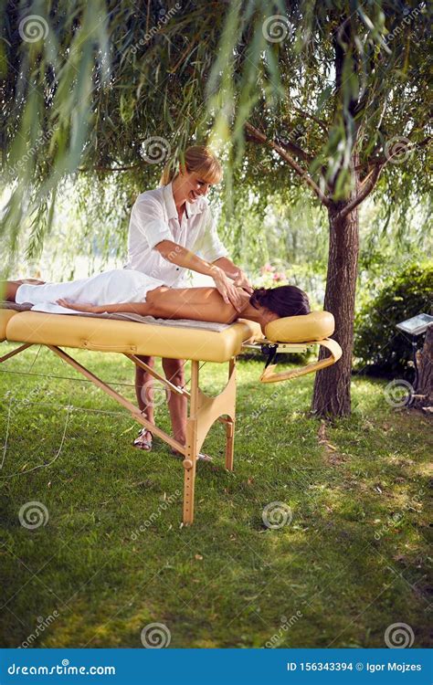 Therapist Doing Massage In Nature Stock Photo Image Of Nature