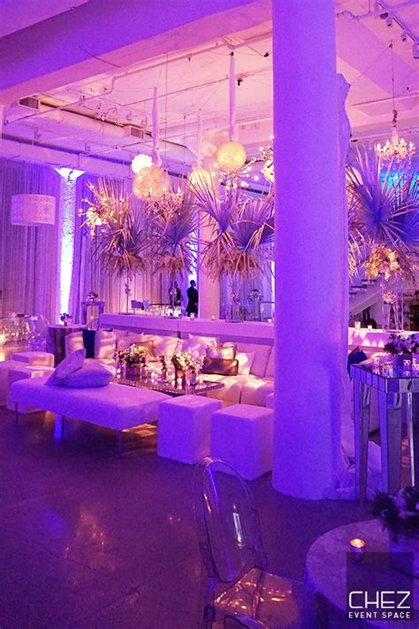 Modern Event Reception Ideas With White Couches And Botanical Theme
