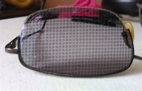 I Left My Transition Lensed Glasses Next To A Window Screen And The Sun Left A Checkerboard