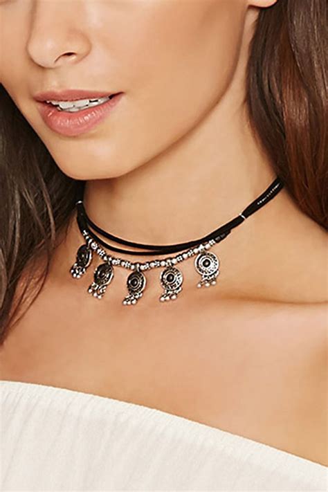 A Layered Choker Nec A Layered Choker Necklace Featuring Etched Tribal