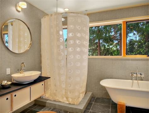 Choose curtains for a small bathroom that matches your taste and the color of the tiles and make the room appear larger. Making Your Bathroom Look Larger With Shower Curtain Ideas