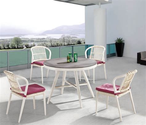 Keep up with what we're up to. Kitaibela Modern Outdoor Armless Dining Set For Four With ...