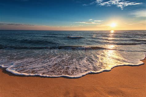 Beautiful Sunrise Over The Sea Ocean Waves Washing The