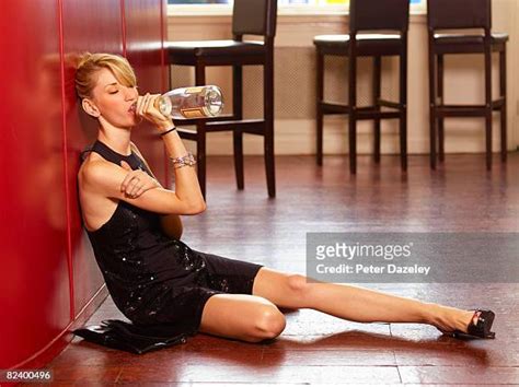 Drunk Woman On Floor Photos And Premium High Res Pictures Getty Images