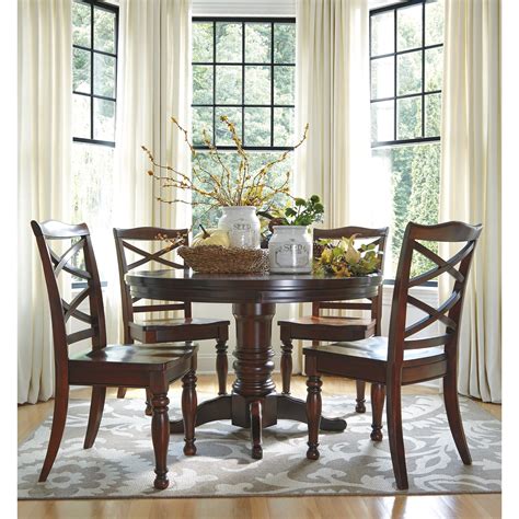 Ashley Furniture Porter Round Dining Room Pedestal Table With Leaf Ahfa Dining Tables
