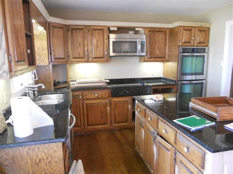 If you're willing to invest the effort, you can even end up with a true professional look. painted-kitchen-cabinets-with-contrasting-island-before-01 ...