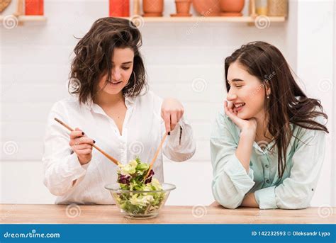 Female Couple Cooking Fresh Green Salad Together Stock Image Image Of Cook Cuisine