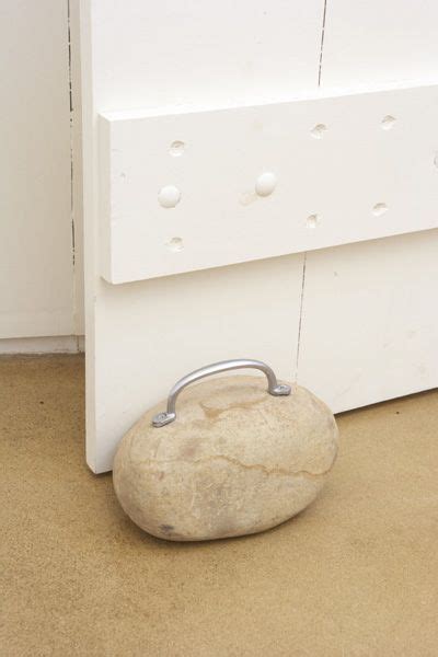 We Spotted This Funky Doorstop Made From A Large Rock And Handle At