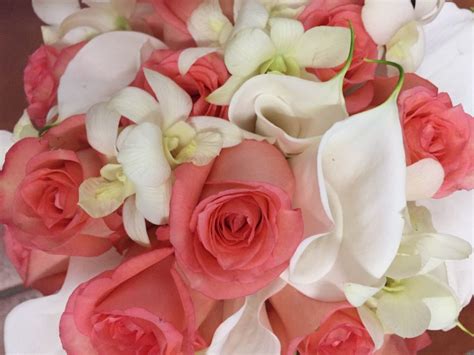 Coral Pink Roses With Cala And Singapore Lilly Bouquet Bridemaids