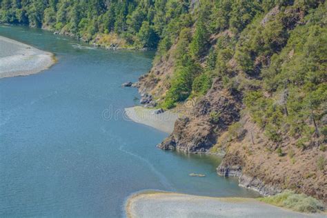 The Rogue River Flowing Through The Siskiyou National Forest In Oregon