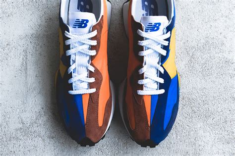 New deadstock new balance 327 blue yellow orange uk 6 us 6.5 trainers in hand. New Balance 327 general release | 25 Gramos
