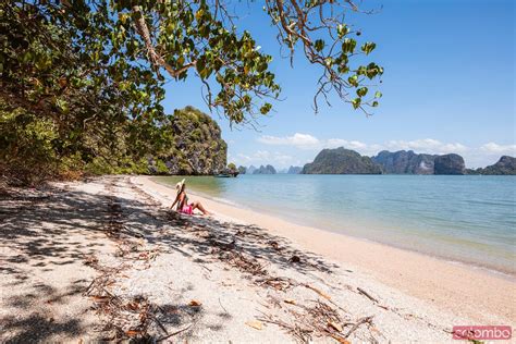 Woman With Sarong Sitting On Beach Phang Nga Bay Thailand Royalty
