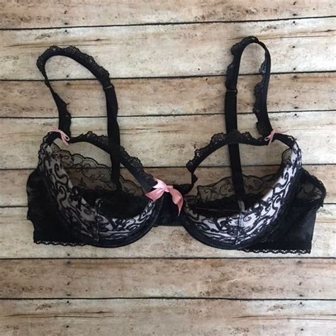 Sheer Black Lace With Vs In Design Over Padded Cream Colored Half Cup