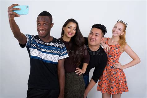 Studio Shot Of Happy Diverse Group Of Multi Ethnic Friends Smili Stock