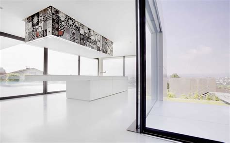 Notice the built ins bench seat is a gray stone matching the other grays. White Room Interiors: 25 Design Ideas for the Color of Light