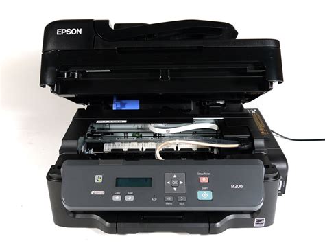 The wifi light should now be on, but not flashing. Multifuncional Epson WorkForce M200, Inyección ...