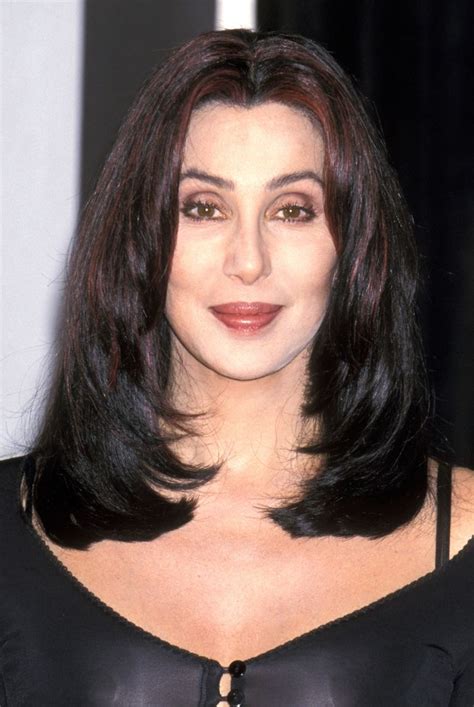 Gather hair at the nape of the neck. Cher's Hair Evolution - Most Famous Cher Hairstyles
