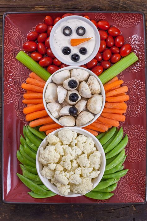 13 fun, festive christmas cookie decorating ideas. This Christmas Veggie Tray Snowman is easy enough for kids to make, and too cute to r ...