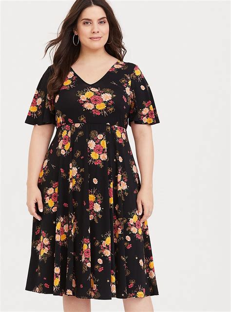 Step into our updated edit of women's peplum dresses and get ready to blow 'em away. Black Floral Studio Knit Midi Dress | Plus size dresses ...