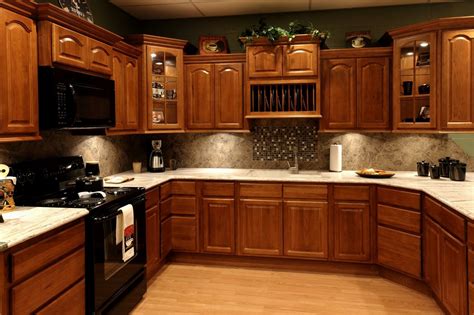 You get a modern look with slate gray walls. Paint Colors For Kitchen Cabinets With Black Appliances ...