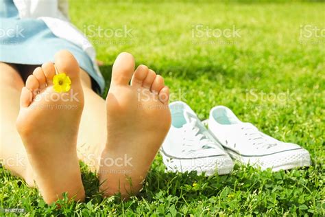 Female Bare Feet On Mawed Lawn Grass Young Woman Resting Outdoors