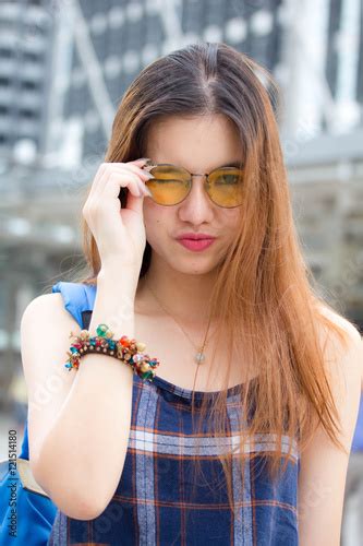 Portrait Of Thai Chinese Adult Glasses Beautiful Girl Denim Blue Bag