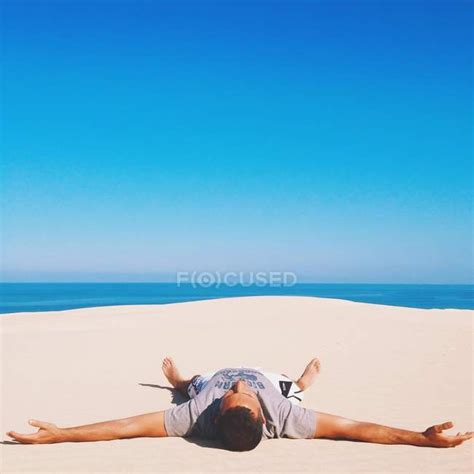 Man Lying On Beach — Enjoying Copy Space Stock Photo 140816234