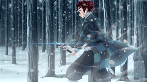demon slayer tanjiro kamado with sword on snow covered forest with background of trees 4k hd
