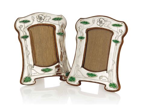 A Matched Pair Of William Hutton And Sons Silver And Enamel Photograph