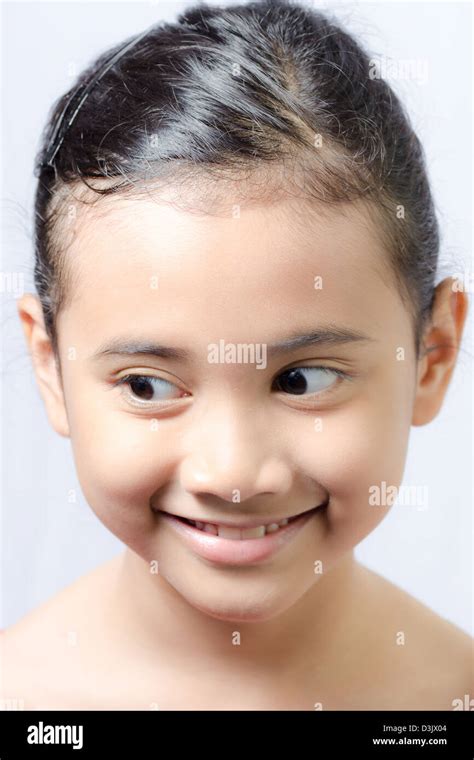 Smiling Little Asian Girl On Isolated White Background Stock Photo Alamy