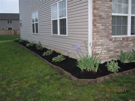 Black Mulch Landscaping We Used Rectangular Pavers Along With Black