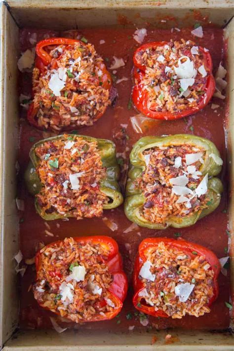 Stuffed Peppers With Beef Rice Tomato Sauce Onions And Garlic With