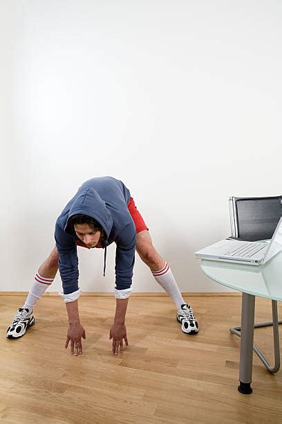 Best Bent Over Desk Stock Photos Pictures And Royalty Free Images Istock