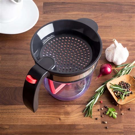 Or, if you are trying to capture cream from goat's milk, a separator is pretty much a necessity. KSP Grip Acrylic Fat-Gravy Separator | Kitchen Stuff Plus