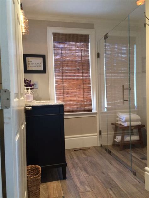 Adorning kitchens, bathrooms and powder rooms, it comes in many colors and fits all. Bathroom remodel- Subway tiled curbless shower, wood ...