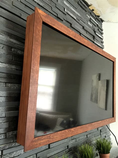 Diy frame disguise your flat screen couponing diy frame disguise your flat screen couponing 2. DIY $40 Wood TV Frame {works for TVs that tilt and rotate ...