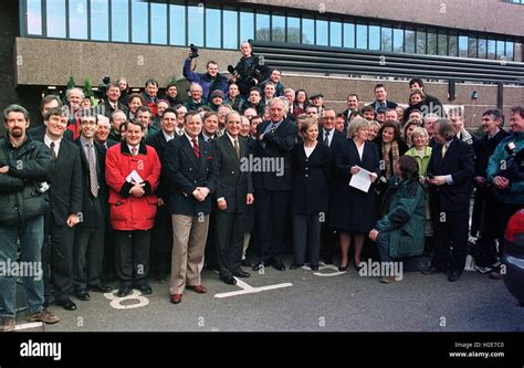 Members Of The Media Who Covered Northern Irelands Good Friday Agreement Pose Together With Sos