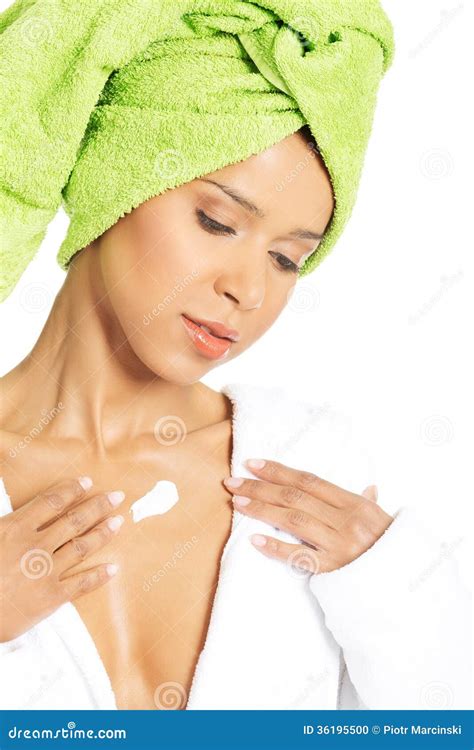 Attractive Woman Rubbing Body Lotion On Chest Stock Photo Image Of Black Cosmetics